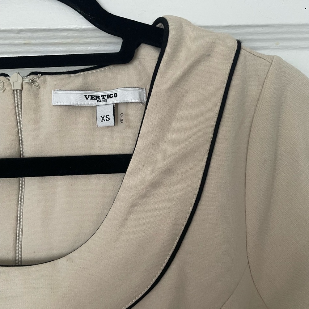 Elegant Cream Dress with Black Trim